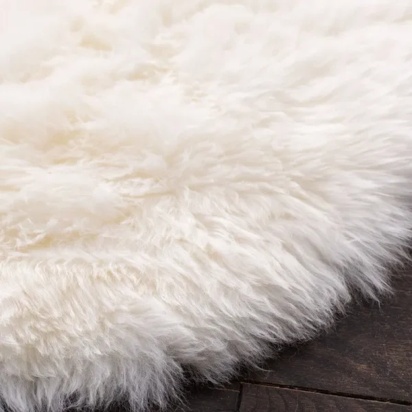 Mera Handmade Sheepskin White Area Rug AllModern Rug Size: Rectangle 2' x 5'