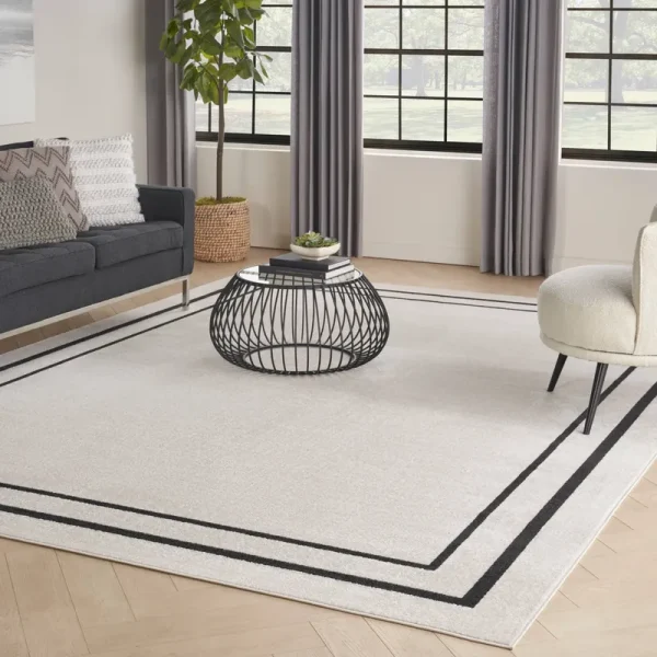 Nourison Sandy Indoor / Outdoor Solid Area Rug Ivory/Black 8'x10' 8' x 10' Blue Rectangle, Beige