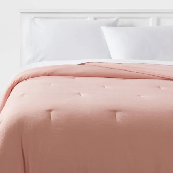Twin/Twin Extra Long Reversible Microfiber Micro Texture Comforter Light Pink - Room Essentials